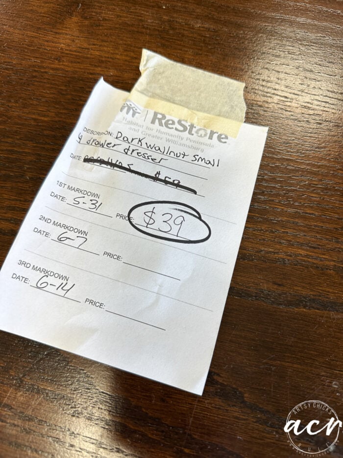 small white price tag on furniture