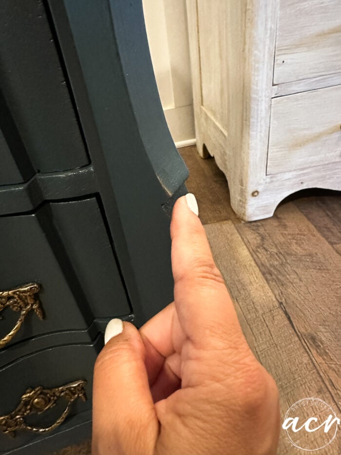 rubbing on the bronze paste edges of dresser