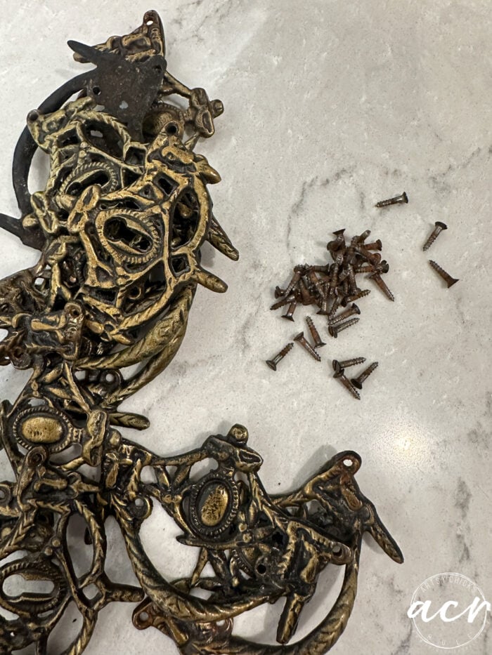 old gold and black hardware on counter