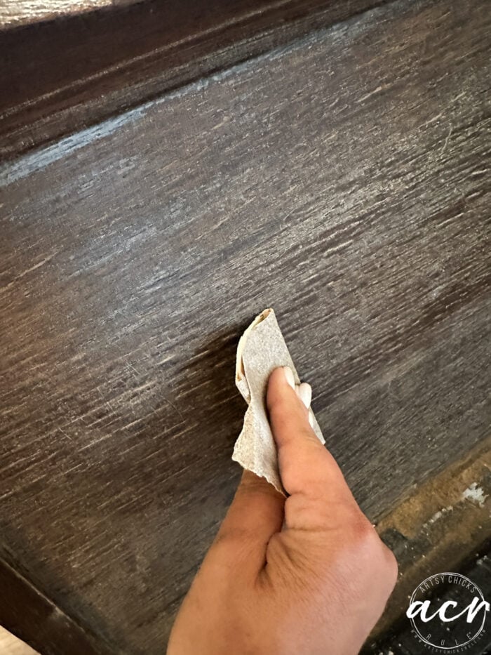sanding the side of the dresser
