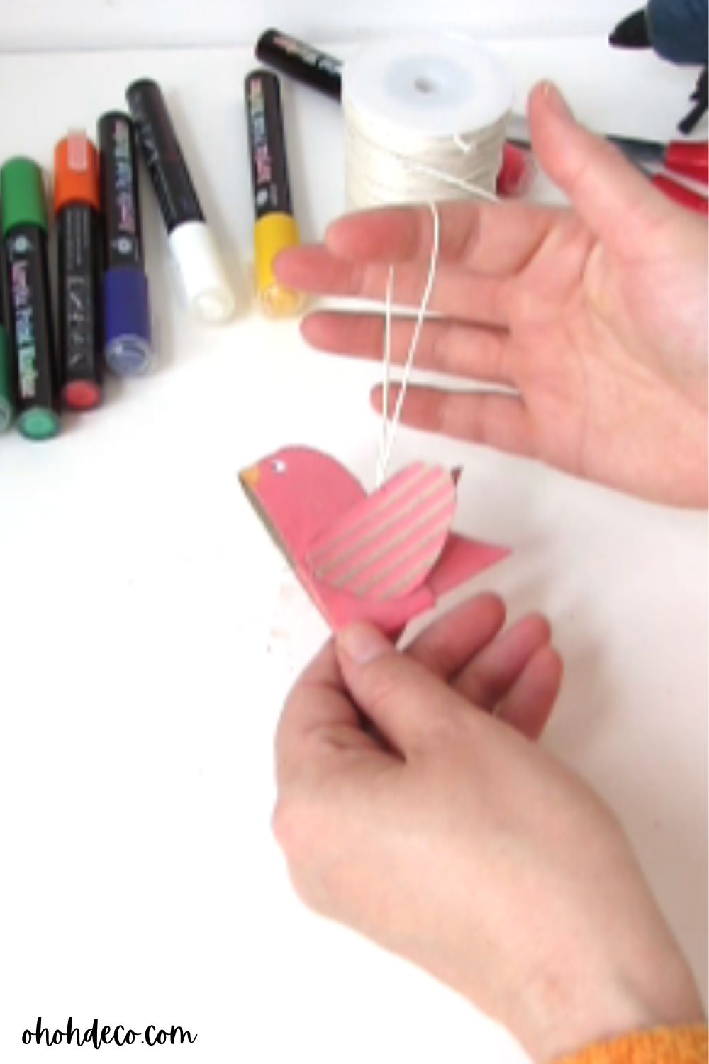 glue rope to finish the bird ornament