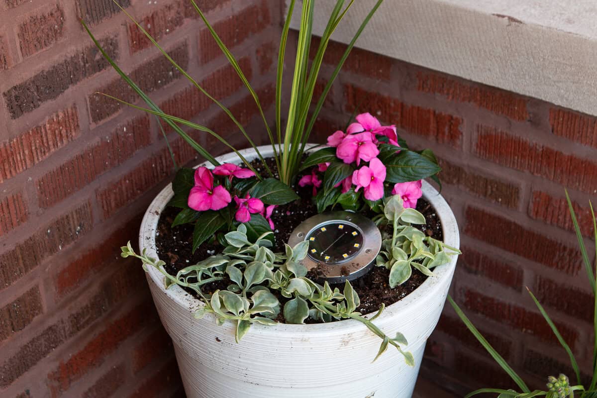 My front porch pot with pink impatiens