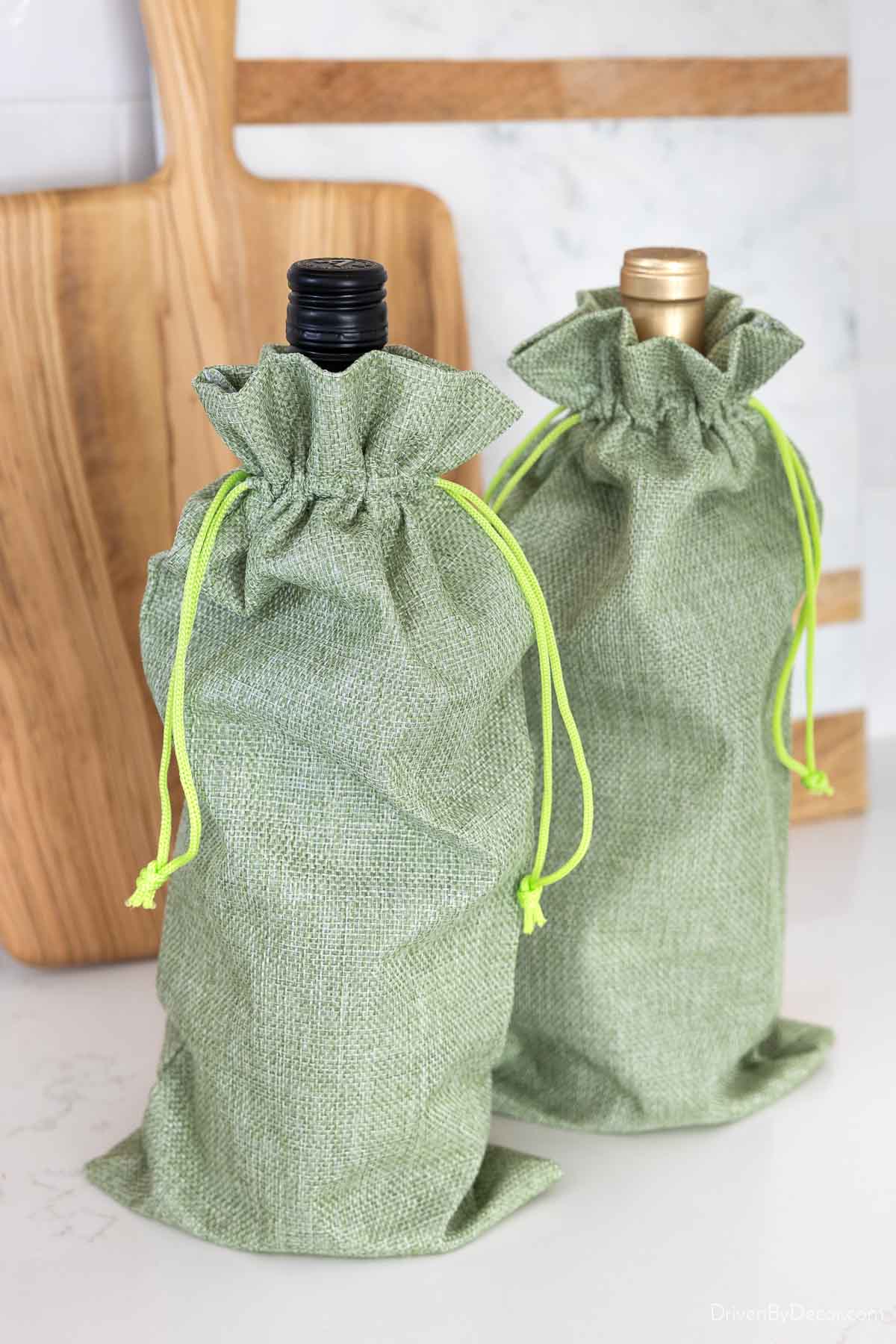 Green burlap wine bags