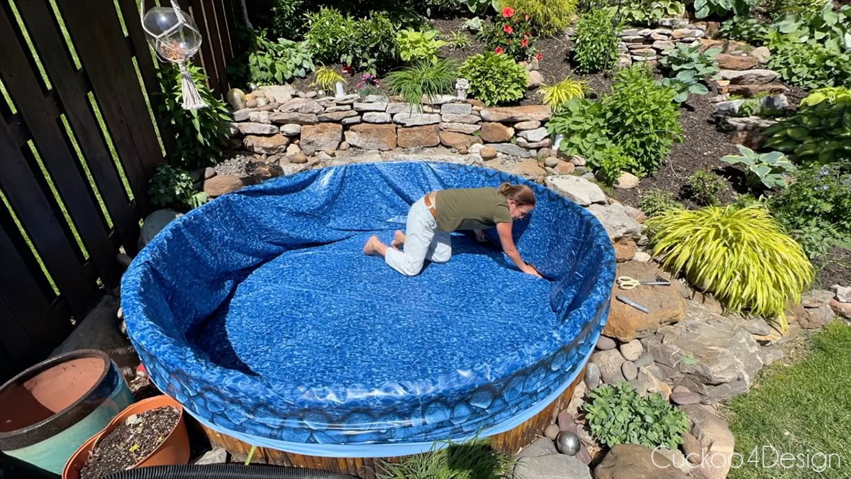 smoothing out pool liner wrinkles on the bottom of the stock tank pool