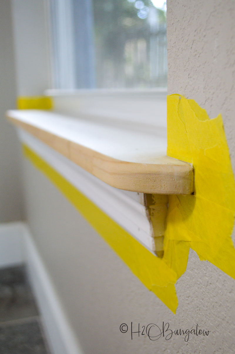 painters tape tips on window sill